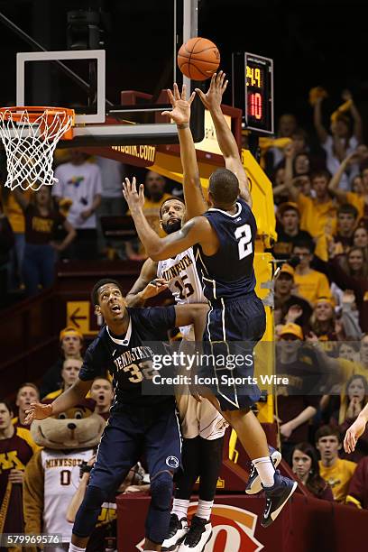 March 8, 2015 Penn State Nittany Lions guard D.J. Newbill goes up for a shot while Gophers forward Maurice Walker attempts to block it and Penn State...