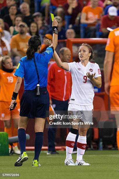 Canada defender Josee Belanger argues with referee Ri Hyang Ok during the 2015 FIFA Women's World Cup Group A match between Netherlands and Canada at...