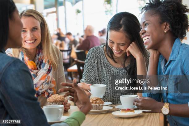 women eating breakfast in cafe - friends in cafe stock pictures, royalty-free photos & images