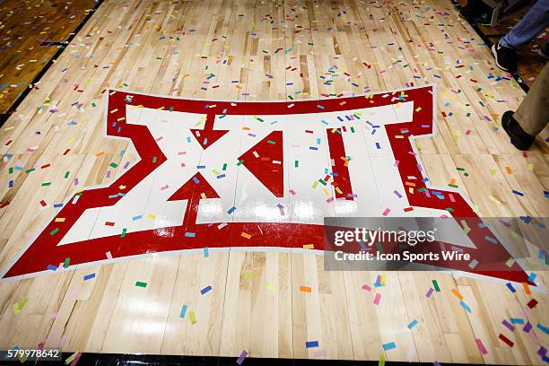 The Big 12 logo is covered in confetti after the NCAA Big 12 Women's basketball championship game between the Baylor Bears and the Texas Longhorns at...