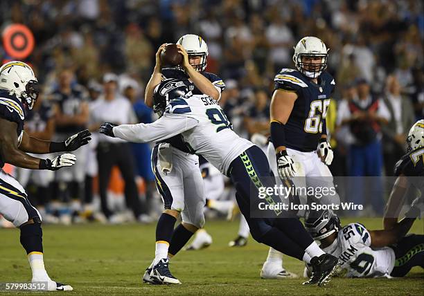 Seahawks Greg Scruggs sacks Chargers Brad Sorensen during an NFL preseason game between the Seattle Seahawks and the San Diego Chargers at Qualcomm...