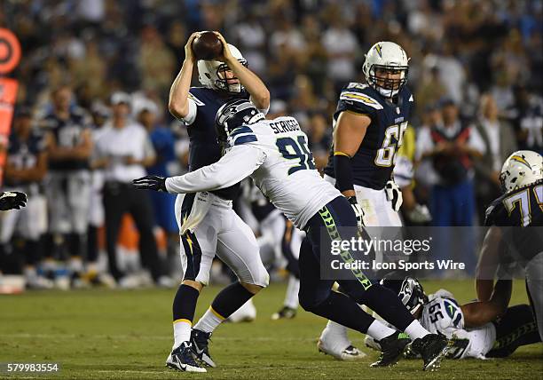 Seahawks Greg Scruggs sacks Chargers Brad Sorensen during an NFL preseason game between the Seattle Seahawks and the San Diego Chargers at Qualcomm...