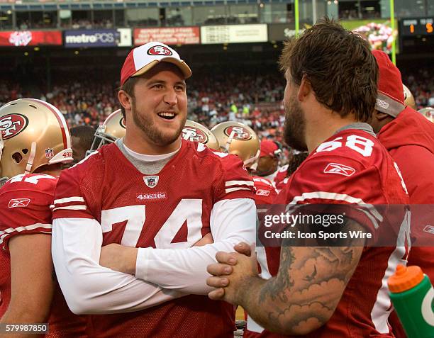 San Francisco 49ers offensive tackle Joe Staley and guard Adam Snyder talk on sidelines on Saturday, August 22, 2009 at Candlestick Park in San...