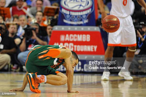 Miami Hurricanes guard Angel Rodriguez loses his footing in the semifinal of the ACC Tournament at the Verizon Center in Washington, D.C. Where the...