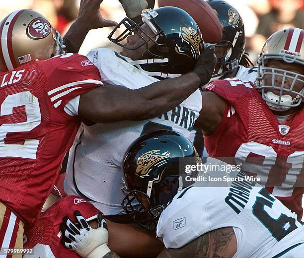 San Francisco 49ers linebacker Patrick Willis and defensive end Ray McDonald sack Jacksonville Jaguars quarterback David Garrard on Sunday, November...