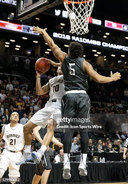 Davidson Wildcats guard Jordan Barham blocks a shot by St. Bonaventure Bonnies guard Jaylen Adams during the 2nd half of the NCAA Atlantic 10 Men's...