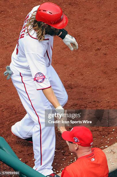 Washington Nationals left fielder Jayson Werth is congratulated by manager Matt Williams after hitting a two run home run against the Miami Marlins...