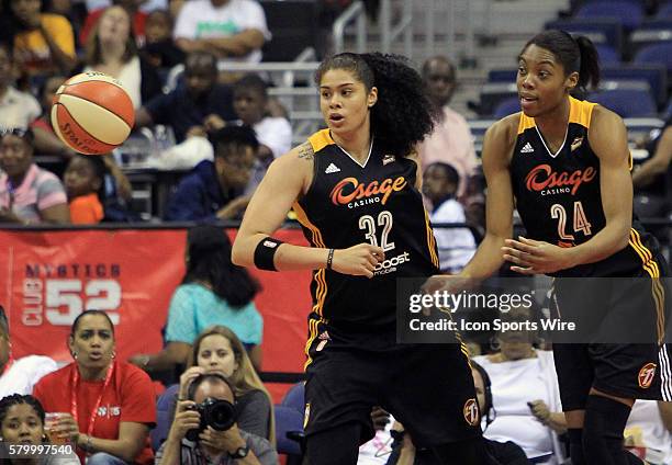 Amanda Zahui B and Vicki Baugh of the Tulsa Shock in action against the Washington Mystics during a WNBA game at Verizon Center, in Washington D.C....