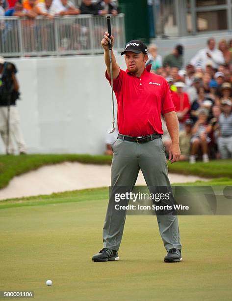 Holmes eyes his shot on the 18th green during the Final Round of the PGA - World Golf Championships-Cadillac Championship at Trump National Doral, in...