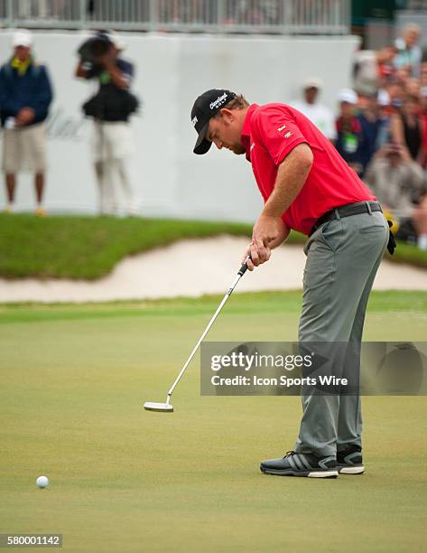 Holmes swings on the 18th green during the Final Round of the PGA - World Golf Championships-Cadillac Championship at Trump National Doral, in Doral...