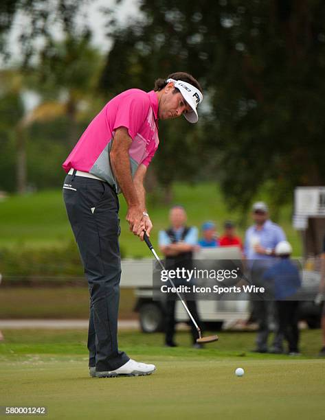 Bubba Watson strokes on the 17th green during the Final Round of the PGA - World Golf Championships-Cadillac Championship at Trump National Doral, in...