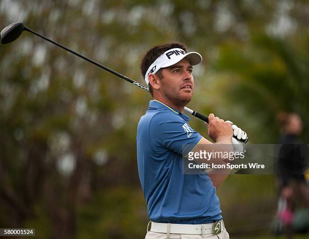 Louis Oosthuizen swings on the 16th green during the Final Round of the PGA - World Golf Championships-Cadillac Championship at Trump National Doral,...