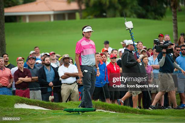 Bubba Watson watches his ball at the 16th green during the Final Round of the PGA - World Golf Championships-Cadillac Championship at Trump National...