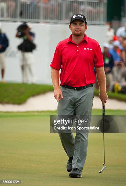 Holmes upset with his shot on the 18th green during the Final Round of the PGA - World Golf Championships-Cadillac Championship at Trump National...