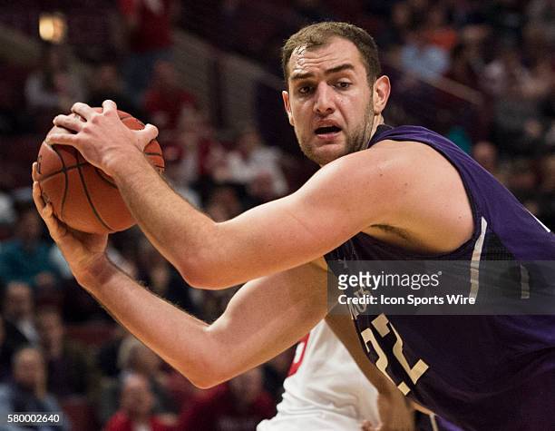 Northwestern's Alex Olah rebounds the ball during the Big Ten Men's Basketball Tournament game between the Northwestern Wildcats and the Indiana...