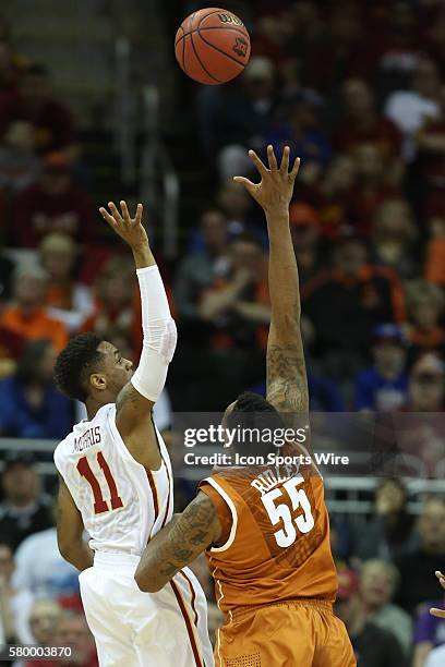 Iowa State guard Monte Morris puts up a floater over the defending Texas forward Cameron Ridley during the Thursday game between Iowa State and Texas...