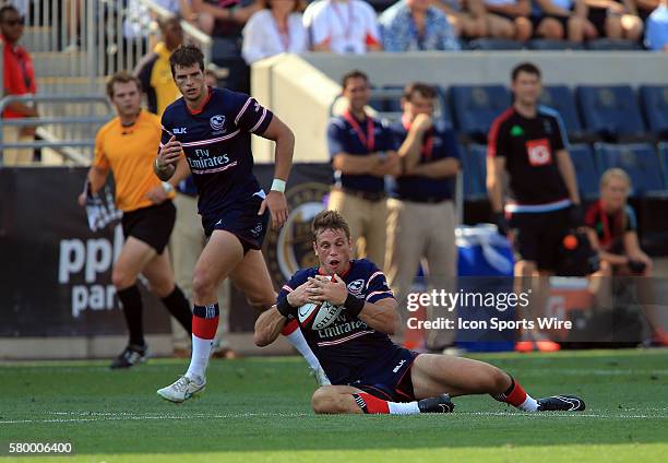 Blaine Scully of the USA Eagles pulls in a pass against Harlequins during an international rugby friendly match at PPL Park, in Chester, PA....