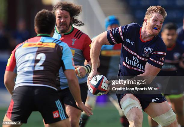 John Quill of the USA Eagles passes away from Ben Botica of Harlequins during an international rugby friendly match at PPL Park, in Chester, PA....