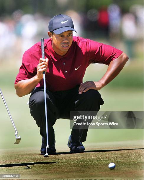 Tiger Woods lines up a putt during the final round of the U.S. Open at Shinnecock Hills GC in Southampton, N.Y. | Location: Shinnecock, New York, USA.