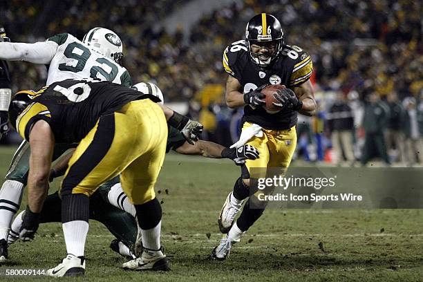 Pittsburgh Steelers receiver Hines Ward outruns the New York Jets defense to score a touchdown in the AFC divisional playoffs at Heinz Field in...