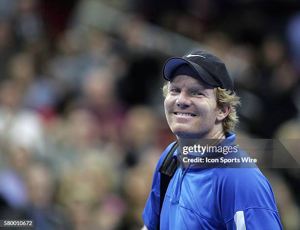 Jim Courier smiles at the crowd while leaving the court during the Serving for Tsunami Relief tennis match at Toyota Center in Houston, Texas. Tennis...