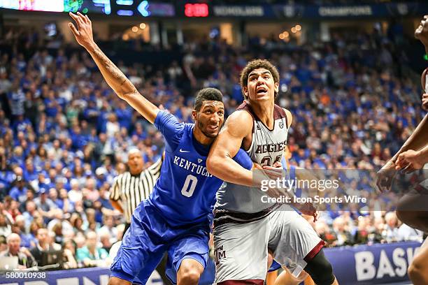 Kentucky Wildcats forward Marcus Lee and Texas A&M Aggies center Tyler Davis fights for position during the 2016 SEC Basketball Championship...