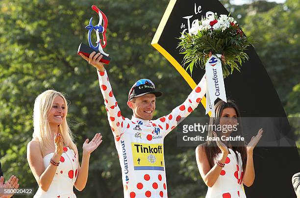 Rafal Majka of Poland and Tinkoff celebrates winning the dot jersey of best climber following stage 21, last stage of the Tour de France 2016 between...
