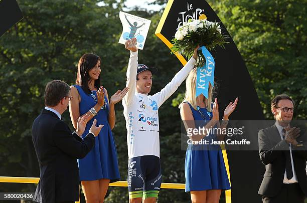 Adam Yates of Great Britain and Orica-BikeExchange celebrates winning the white jersey of best young rider following stage 21, last stage of the Tour...