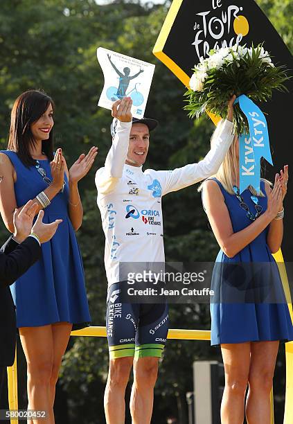 Adam Yates of Great Britain and Orica-BikeExchange celebrates winning the white jersey of best young rider following stage 21, last stage of the Tour...
