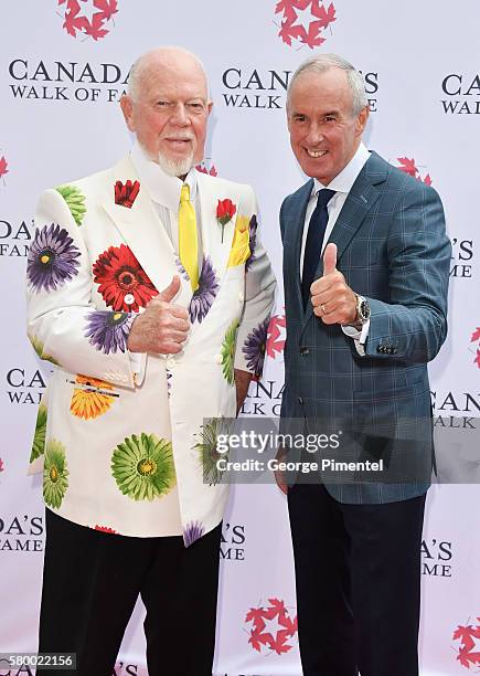 Canadian hockey commentator's Don Cherry and Ron MacLean attend the Canada's Walk Of Fame Star Unveiling at David Pecaut Square on July 25, 2016 in...