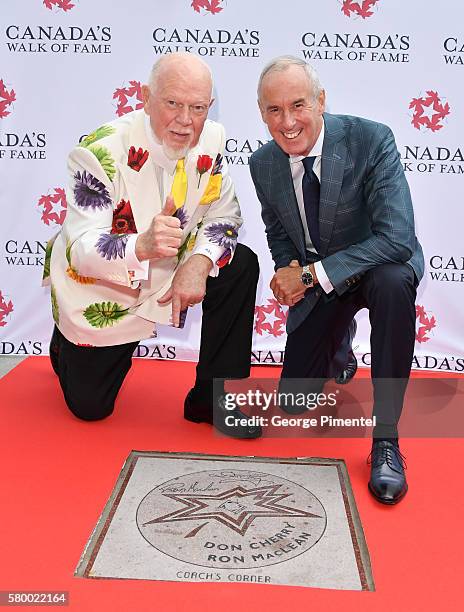 Canadian hockey commentator's Don Cherry and Ron MacLean attend the Canada's Walk Of Fame Star Unveiling at David Pecaut Square on July 25, 2016 in...