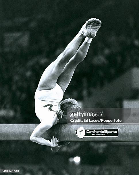 Olga Korbut of USSR in action on the balance beam during the Gymnastics World Cup at Wembley Arena in London, 20th October 1975.