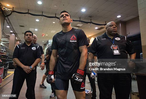 Rafael Dos Anjos of Brazil prepares to enter the Octagon before facing Eddie Alvarez in their lightweight championship bout during the UFC Fight...