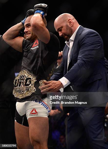 Eddie Alvarez celebrates his victory over Rafael Dos Anjos of Brazil in their lightweight championship bout during the UFC Fight Night event inside...