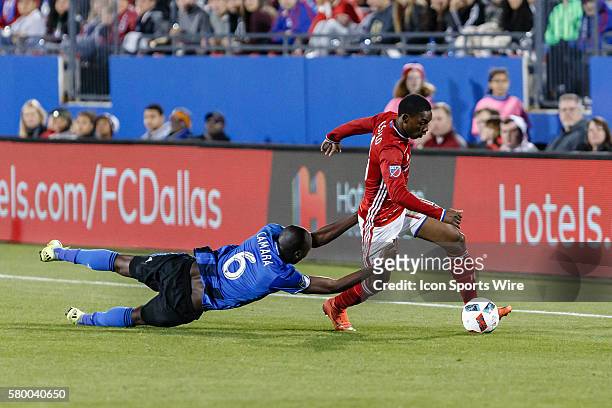 After being beat, Montreal Impact defender Hassoun Camara reaches out to grab FC Dallas forward Fabian Castillo during the MLS match between the...