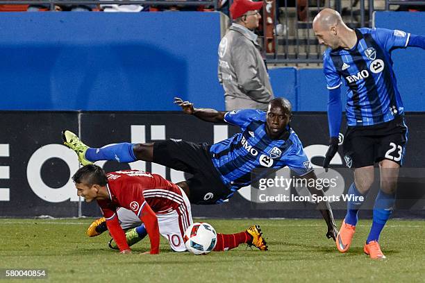 Dallas midfielder Mauro Diaz is fouled by Montreal Impact defender Hassoun Camara during the MLS match between the Montreal Impact and FC Dallas at...