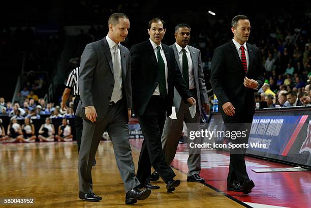 Assistant coach Paul Mills of the Baylor Bears, Head Coach Scott Drew of the Baylor Bears, Assistant coach Jerome Tang of the Baylor Bears and...