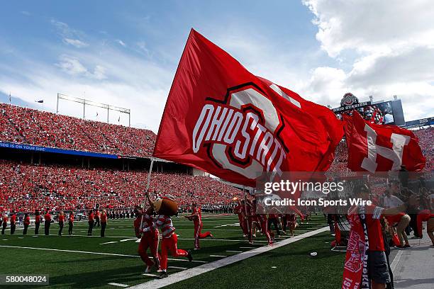 Brutus the Buckeye, who runs fifty years old this season, leads the Buckeyes onto the field prior to the game between the Ohio State Buckeyes and the...