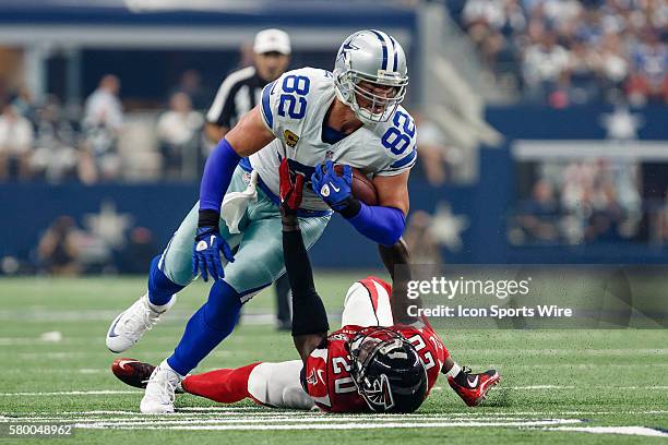 Dallas Cowboys Tight End Jason Witten [3533] runs over Atlanta Falcons Cornerback Phillip Adams [10749] during the NFL game between the Atlanta...