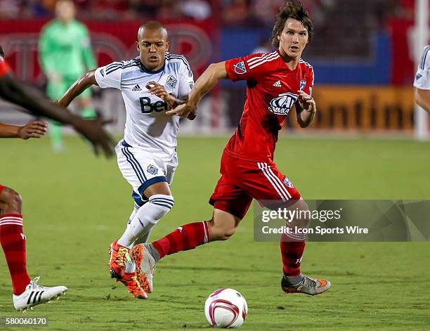 Dallas Zach Loyd and Whitecaps Robert Earnshaw during the MLS game between the Vancouver Whitecaps FC and FC Dallas at Toyota Stadium in Frisco,Texas.