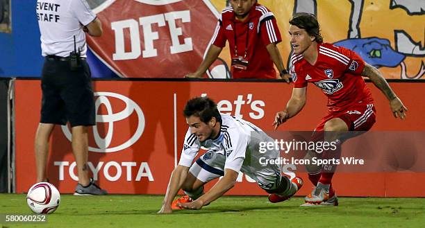 Vancouver Whitecaps Octavio Rivero gets tripped by FC Dallas Zach Loyd during the MLS game between the Vancouver Whitecaps FC and FC Dallas at Toyota...