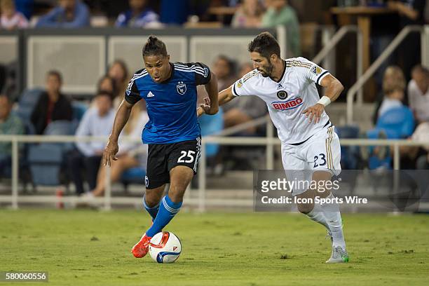 Quincy Amarikwa of the San Jose Earthquakes runs away from the challenge of Steven Vitoria of the Philadelpia Union during an MLS game between the...