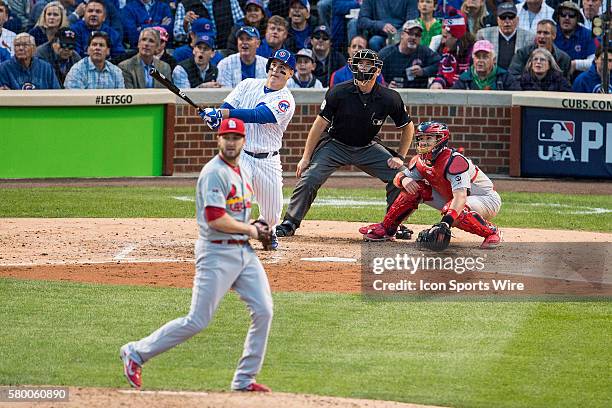 Chicago Cubs first baseman Anthony Rizzo hits a home run, during game 4, of the NLDS, in a game between the St Louis Cardinals, and the Chicago Cubs,...