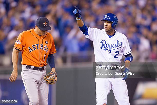 Kansas City Royals shortstop Alcides Escobar points to the dugout after getting on base during the ALDS series game between the Houston Astros and...