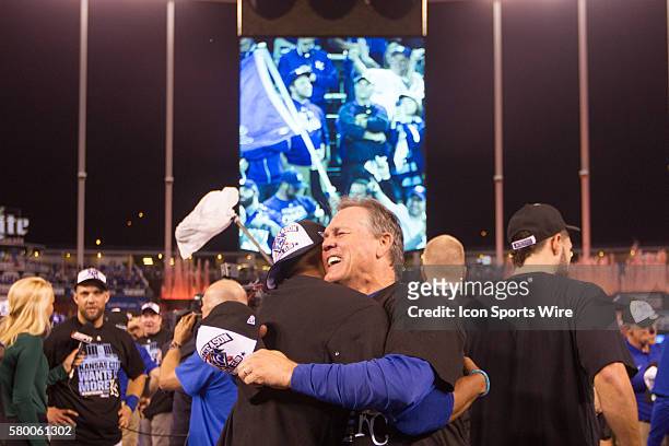 Kansas City Royals manager Ned Yost embraces a player after winning the ALDS series game between the Houston Astros and the Kansas City Royals at...