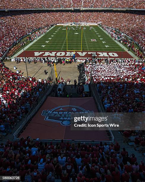 Fans cheer from the stands of the Cotton Bowl during the Oklahoma Sooners versus the Texas Longhorns in the Red River Rivalry at the Cotton Bowl in...