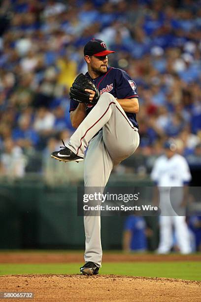 Minnesota Twins pitcher Mike Pelfrey [6139] pitches early in a game against the Kansas City Royals at Kauffman Stadium in Kansas City, MO.