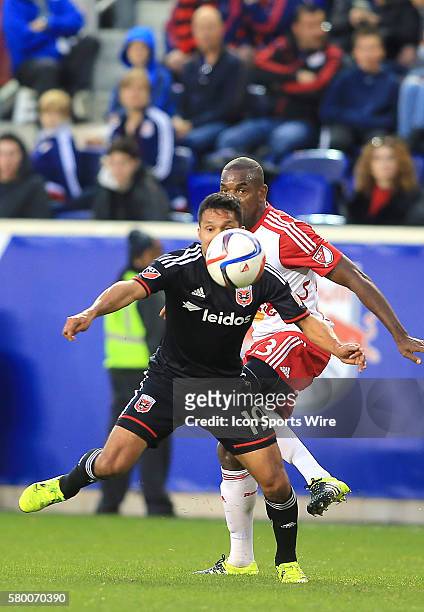 New York Red Bulls defender Ronald Zubar moves up behind D.C. United forward Jairo Arrieta during the second leg of the MLS Eastern Conference...