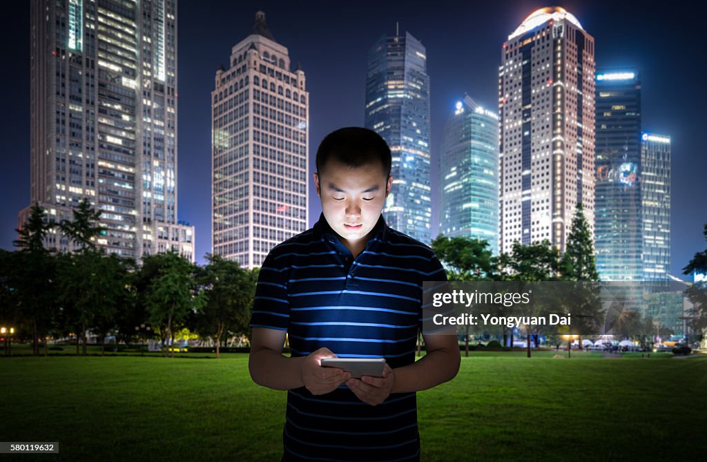 Man Using a Digital Tablet