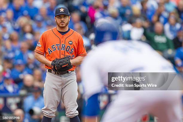 Houston Astros starting pitcher Scott Kazmir looks to first base during the MLB Playoff ALDS game 2 between the Houston Astros and the Kansas City...